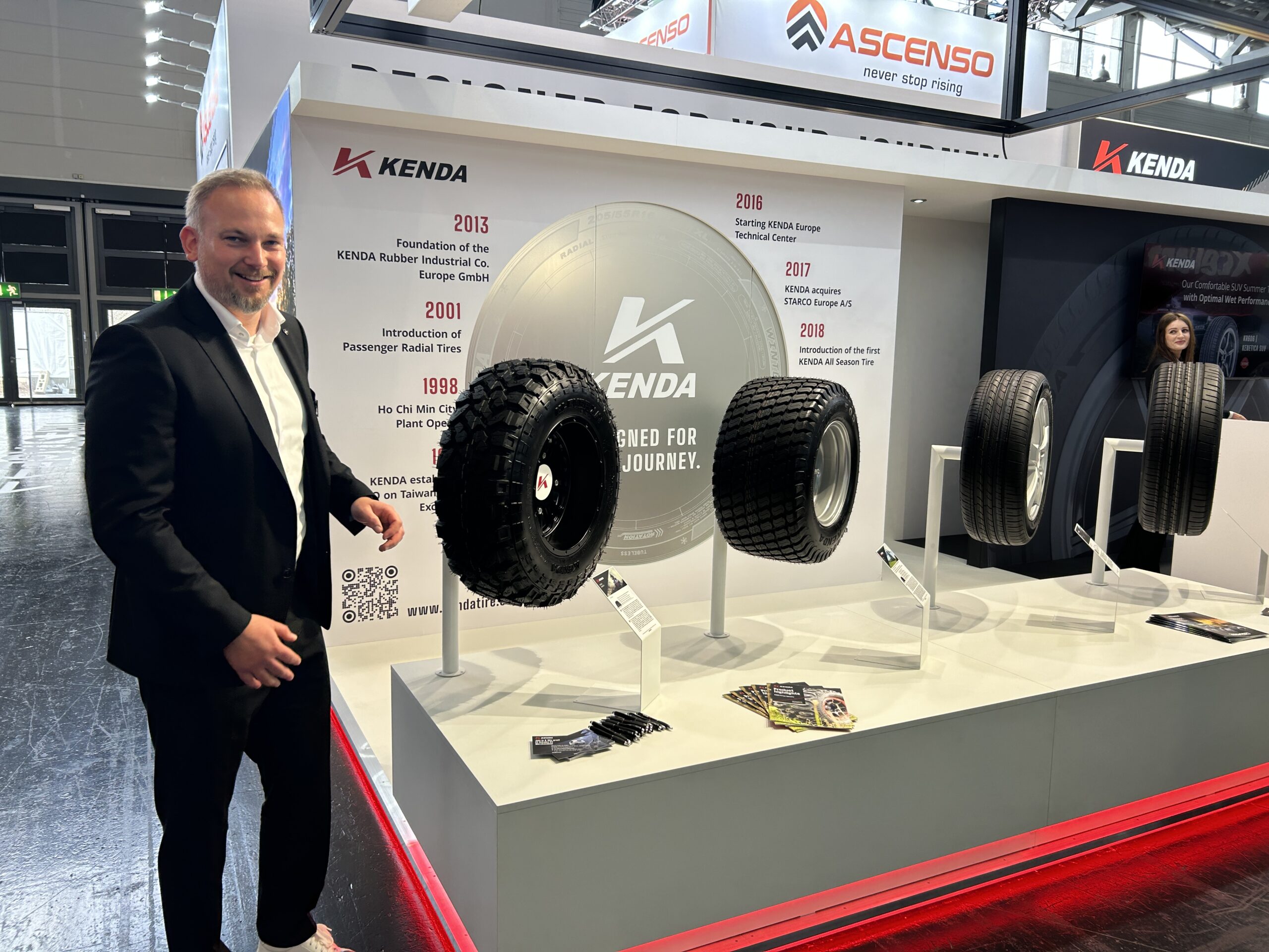 Aftermarket Sales Director for KENDA Europe Specialty, Andreas Thorborg, standing at KENDA's tire cologne stand